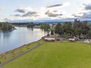 Arial view of Horse Shoe Lake Park - looking over a field and the river.
